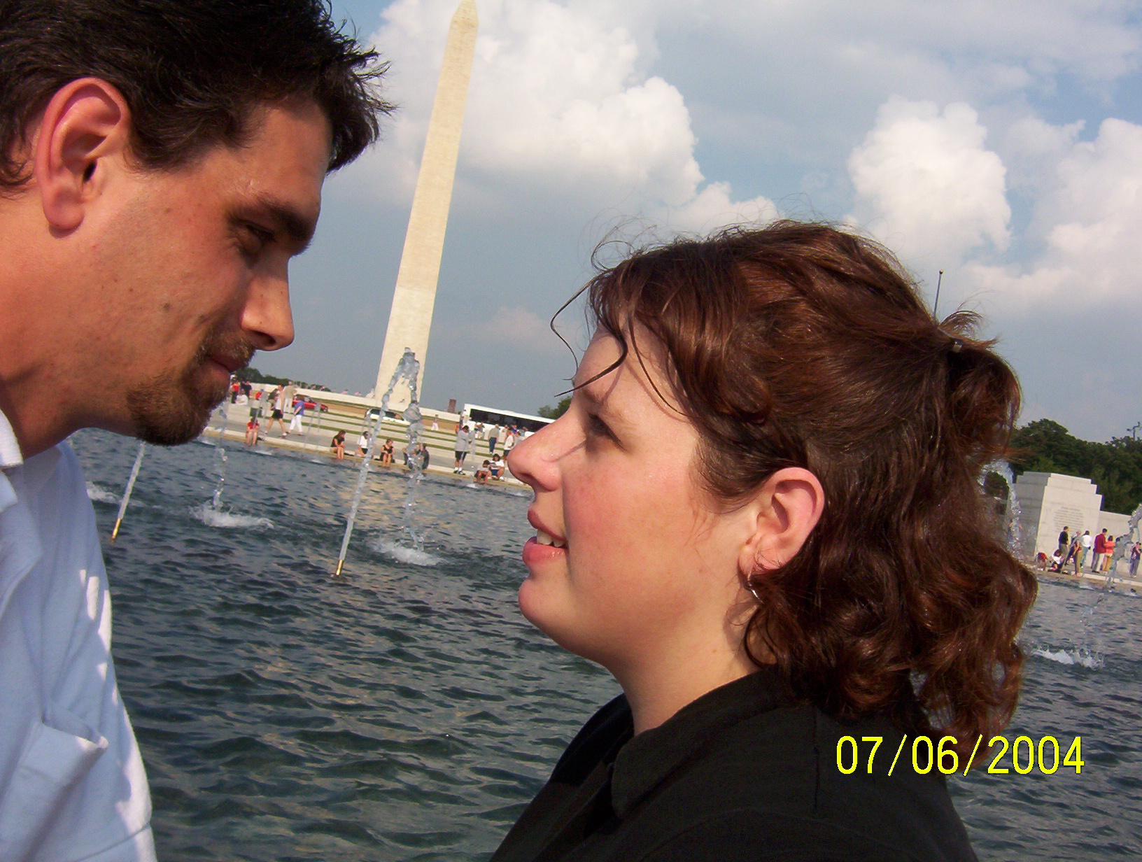 Me and my beautiful bride - This is my wife and I at the Washington DC. We live close by and took this picture when visiting the then new WWII memerioal. The backdrop shows the Washington Monument.