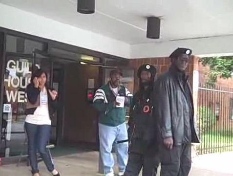 Voter intimidation - Obama's thugs stand in front of a polling place in Philadelphia brandishing nightsticks.