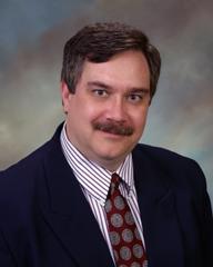 Me - One of my last professional photographs before I left teleconferencing and became a freelance writer.