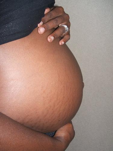 6 Months Prego - This is a belly pic at.... I think 6 months pregnant.