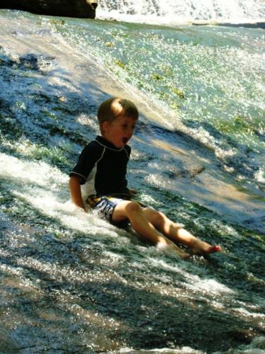 Douglas sliding down waterfall - Waterfall, douglas, falls, children, fun