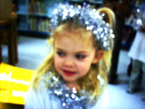 my youngest daughter  - her name is emma and this was taken at her pre K christmas pagent at school , I think she was the prettiest angel there !  ~M~