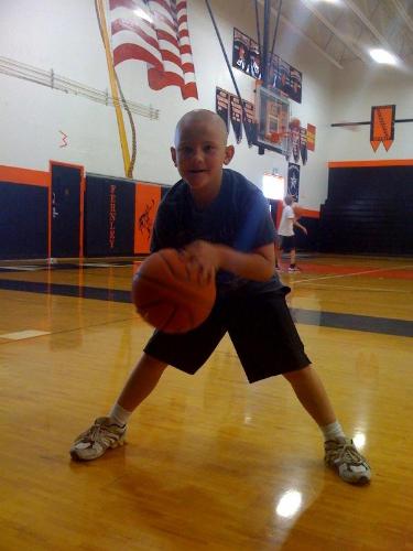 Basketball camp - My 8 year old son is attending basketball camp this week. I love this picture of him.