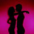 relationships - a man and a woman with a pink background