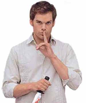 Sshh... - A close up on Dexter not wanting us to reveal his secret.