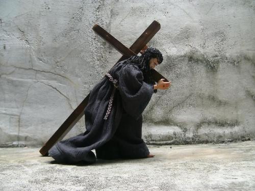 Passion of the Christ Action Figure - Inspired by by the Mel Gibson film, this action figure comes with collapsible wooden cross, a plastic crown of thorns (customarily taken from a Barbie accessory) Gandalf's stolen robes, and a holy sword from the Lord of the Rings. The figure itself is 'Windtalker' Nicolas Cage, but now he looks nearly like Jim Caviezel.   Not for Sale.