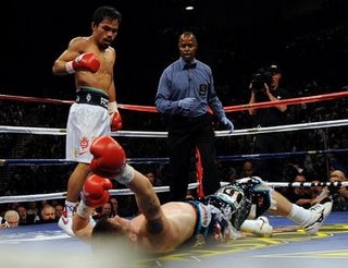 Pacman VS Hitman - Pacman stops Hitman and win another world title.