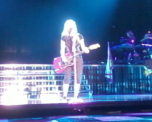 Avril live in concert - Taken on the 3rd june 2008 At the bournemouth international center  Dont you just love the hot pink guitar? (sorry for the poor quality it was taken on my phone)