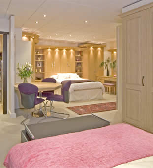 Bedroom - This room is split into two areas for sleeping. One for her, one for him.