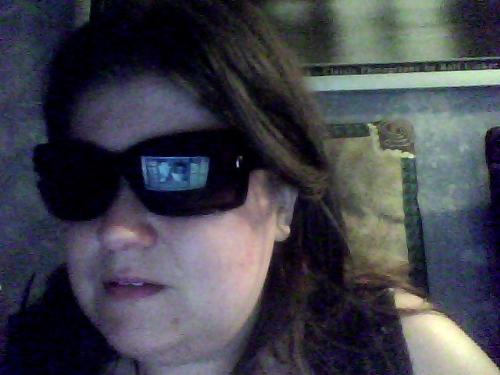 Can You See My Reflection?  - I snapped this picture tonight with my webcam. Can you see the computer reflection through my sunglasses, and on that computer, me in the webcam?