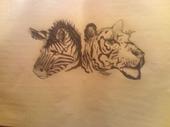 White tiger and Zebra - I thought of this drawing the one day which watching a political debate about differant races and origins or something like that. It was so long ago. But I thought to myself, you know what we are all the same in God's eyes! Look at this picture carefully now. What do the tiger and zebra have in common, yet they are at totally differant ends of the spectrum? They both have stripes yet, the tiger eats the zebra. but the characteristics on the outside are the similar.