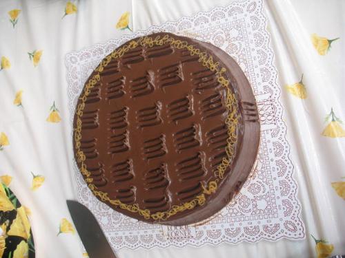 Chocolate Cake for Christmas - This picture was taken by my eldest sister during one of our family reunions at the house of our 2nd cousin (at the father side) before this cake is eaten by my family and our relatives.  Seeing this picture sure makes me want to eat cakes again.