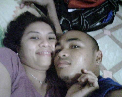 in love couple - This picture shows that both are stuck with each other. Both are enjoying each others company. The picture shows also that both are in a relationship.