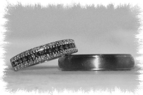 Our Wedding Bands - These are the wedding bands that my hubby and I use to show that we're married. They're pretty catchy and hard to miss, usually. :)