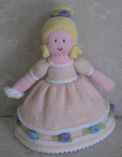 Cinderella doll - This is the pretty Cinderella ready to go to the ball at the castle. If you flip her over she becomes the ragged, dirty Cinderella who has to do all the work for her stepmother and stepsisters.