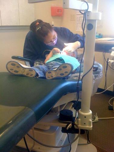 My three year old's first visit to the dentist. Th - My three year old's first visit to the dentist. They let him wear cool sunglasses to protect his eyes.