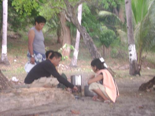 Cooking - Cooking of food while in an outing in the beach