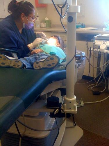 My three year old's first visit to the dentist. Th - My three year old's first visit to the dentist. They let him wear cool sunglasses to protect his eyes.