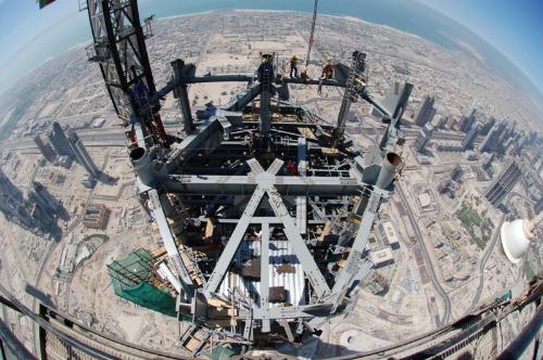 Really amazing - Look at the edge(uppermost right corner) of the picture, you can almost see the turn of the earth. The people working on the upper-most girders can see 'the rotation of the earth'.