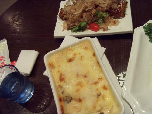 The food made by tofu - The middle one:the cheese covers the tofu. yummy!~ The taste is a little bit just like'the soft cheese cake'    photoed by wendyz in ??? restaurant,Beijing.