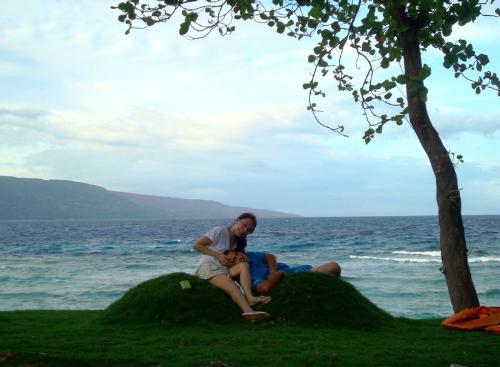 relaxing at an island cliff - Just my and my fiance relazing near a cliff in Sumilon Island. Its the night before I got engaged! The cliff overlooks at a pristine water, untouched and so amzingly beautiful. The breeze was absolutely refreshing...its like a paradise in every sense of the word.