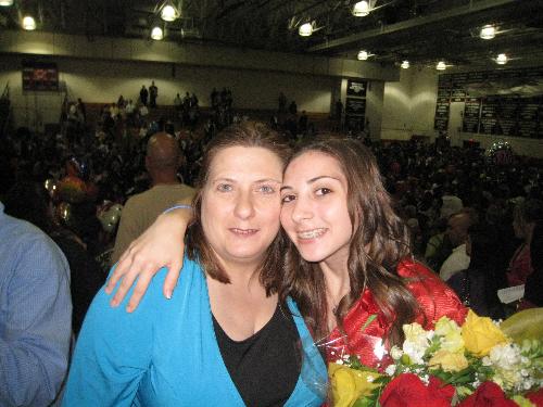 Daughter&#039;s graduation - I am posing with my beautiful daughter just after she received her diploma.