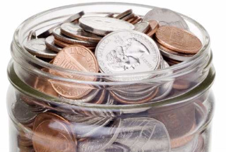 Money - Coins in a money jar.