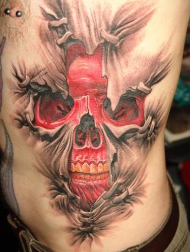 skull wanting to pop out of skin - i actually love the creativity of this tattoo because it is very unconventional and oh so cool