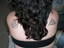 Seal and Triquetra - The Triquetra on my right shoulder was the first tattoo I ever had done. It is symbolic of my relationship with the Goddess. The Seal of the Necronomican I had done after the birth of our daughter and is symbolic of many things.
