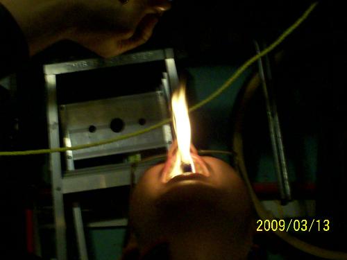 Fire eatsing - Me Eatzing delicious o calorie Fire. I used Rubbing alcohol as an exelenrent and an old kevlar soc to burn.