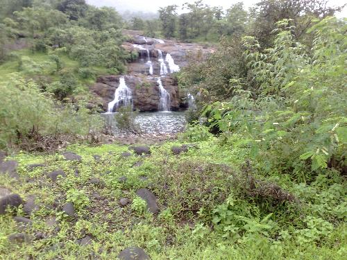 Seasonal waterfall - This waterfall comes alive only during the monsoon season. Located at Pane, Mahad