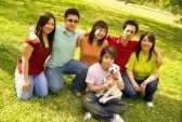 Friends - A group of friends sitting in a park.