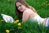Girl lying in park - Let the time pass, I do not care.