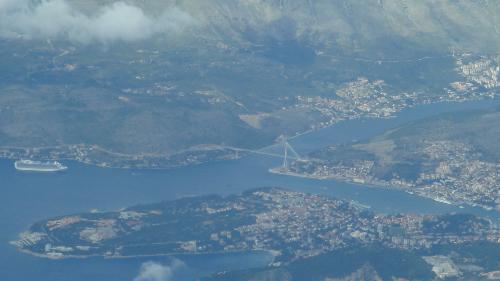 Dubrovnik from the sky - I took this photo on departure from Dubrovnik airport. The coast line around Dubrovnik is amazingly picturesque. There's a cruise ship on its way in too in the photo.