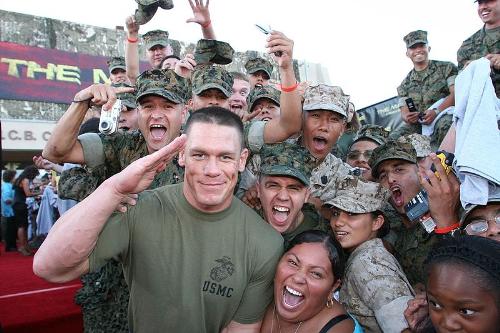 'The Marine' with the Marines - Outside of wrestling, Cena has released the rap album You Can't See Me, which debuted at #15 on the US Billboard 200 chart, and starred in the feature films The Marine (2006) and 12 Rounds (2009).[10] Cena has also made appearances on television shows including Manhunt, Deal or No Deal, MADtv, Saturday Night Live, and Punk'd. Cena was also a contestant on Fast Cars and Superstars: The Gillette Young Guns Celebrity Race, where he made it to the final round before being eliminated, placing third in the overall competition.