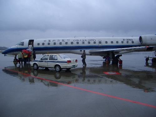 the plane I took in 2008 - Here is a photo I took at the airport, a plane I took on January 26, 2008, when I went to my hometown for the winter vacation on a snowstorm day. I was lucky to get back home before the snow storm arrived. You could see from the picture the heavy cloud in the sky. It was getting darker though it was before ten in the morning.