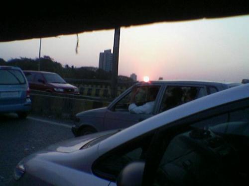 Bombay evening! - This is the evening i Kandivli, Mumbai, one of the rapidly developing places of mumbai. Clicked it when I was in a traffic jam.Bombay evening!