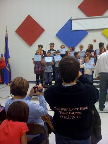 My son Tyler recieving an award for his excellent  - My eight year old son Tyler recieving an award for his excellent grades