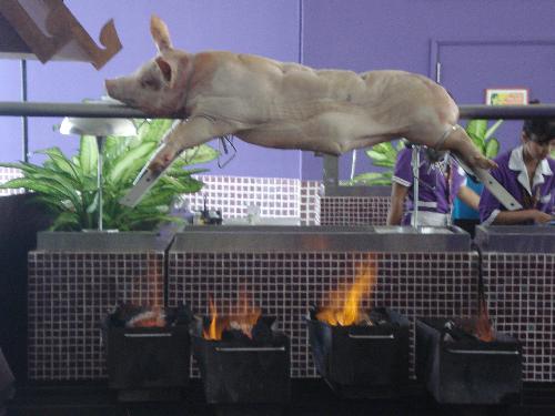 Pork - Pork on fire getting ready for dinner at Pattaya Hotel, Thailand.
