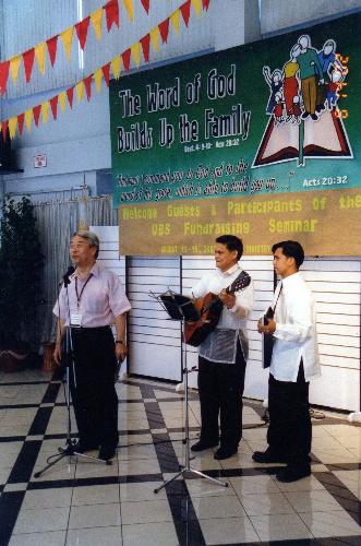 Come and sing!!! - The Japanese guest was assisted by Filipinos in leading the Praise and Worship songs in a Christian company!