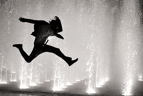 leap for the future - man leaping showing jubilance