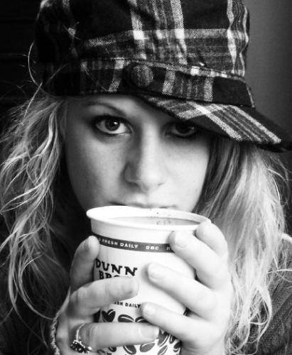Black and White Self- portrait - I was actually lost with a friend in Minnesota and we ended up in a coffee shop. My friend took this picture. It was fun.