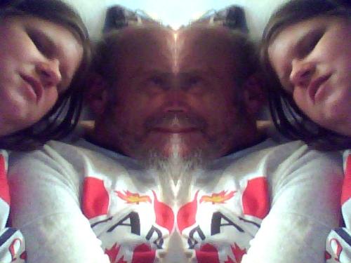 Funny 'Mirror Effect' Shot Of Hubby And I On Canad - Here we are celebrating Canada Day. I took this with the double feature with my computer's webcam.