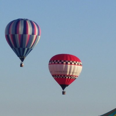 Hot Air Balloons - Two hot air balloons lifting off in Jackson, Michigan