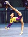 Gymnast - A gymnast doing rhymic gynastics.