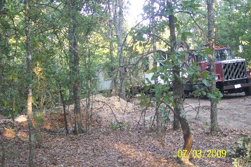 Mobile Home Coming In - Here is the mobile home being brought in. It isn't new, but its in very good condition on the inside. Needs a little cleaning and repair. I think it will make a wonderful home.
