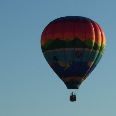 Hot Air Balloon - Scuba diver and fish decorate this colorful hot air balloon as it flies over Jackson, Michigan during Hot Air Jubilee