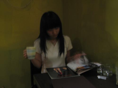 I'm reading - It's the picture when I'm in a Coffee Shop and I was do some reading.I seldom have such a free time to have a rest in the Coffee Shop.So I love this photo very much for I love this kind of feelings.