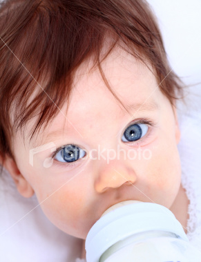 baby baby - a blue eyed baby drinking bottled milk