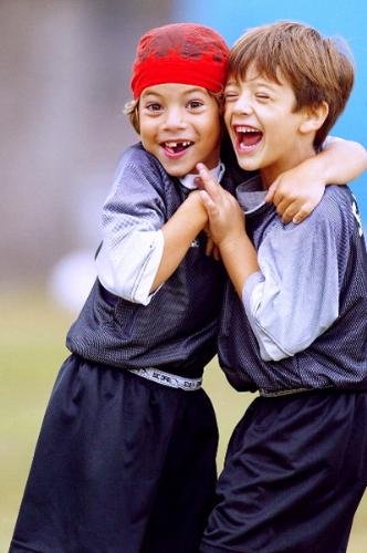 Youth Soccer - Happy Boys - Two boys from local youth soccer league celebrate their victory